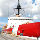 In this Monday, Dec. 12, 2016 photo, the U.S. Coast Guard Cutter Polar Star rests by a dock in Pearl Harbor, Hawaii. The only U.S. ship capable of breaking through Antarctica’s thick ice is undergoing repairs in balmy Hawaii this week as it prepares to head south. (AP Photo/Audrey McAvoy)